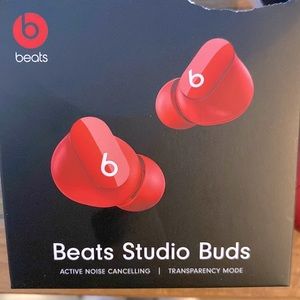 Red Beats Studio Buds with charging cable and 3+free months Apple Music included